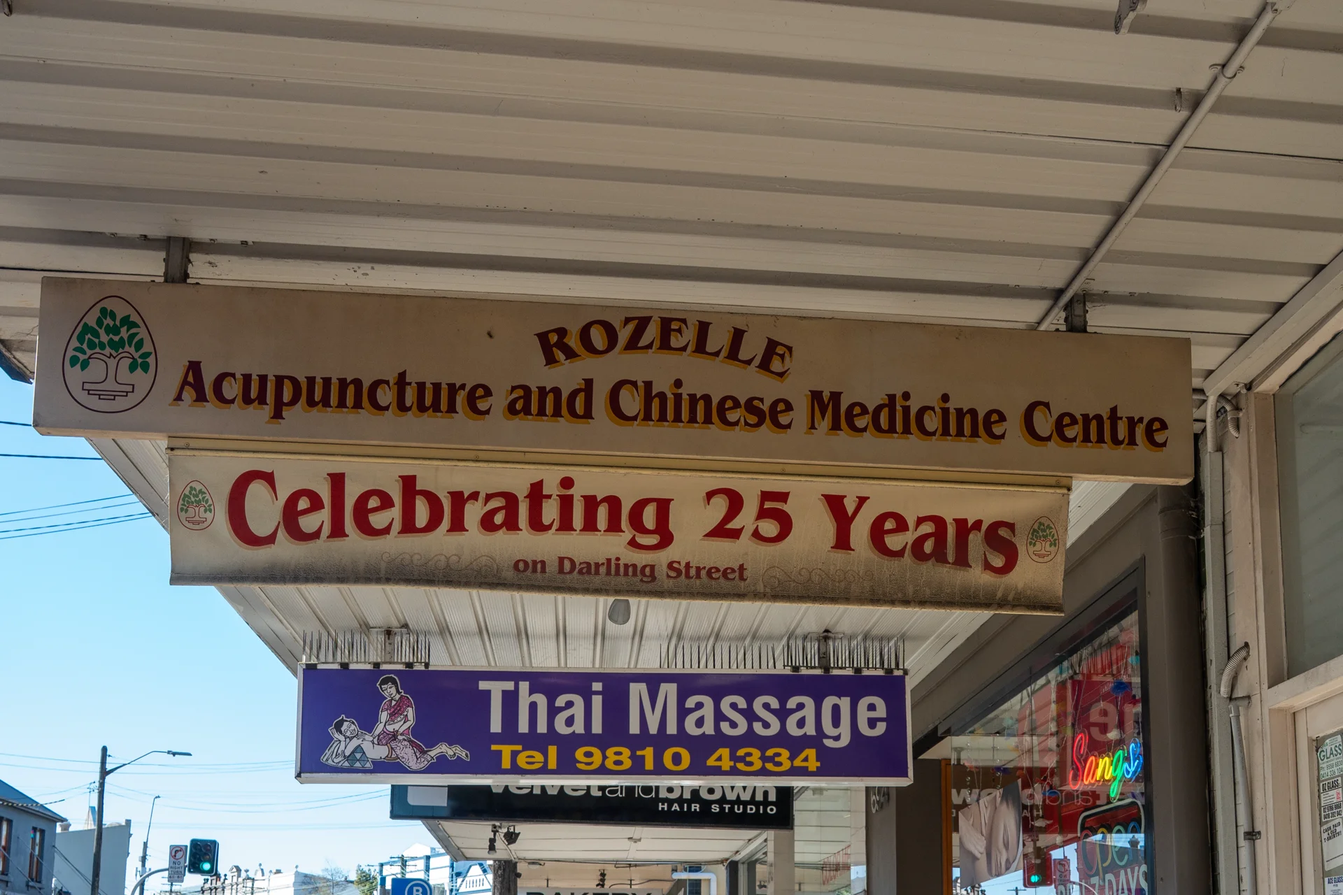 The Rozelle Acupuncture and Chinese Medicine Centre shopfront sign on Darling Street, reading Celebrating 25 Years
